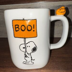 Trending 🥰 Peanuts Snoopy Holding a  “BOO” Sign Halloween 🎃 Mug  by Rae Dunn